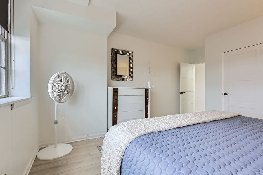 Full size dresser and standing fan