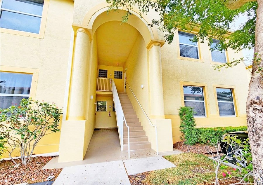 Stairs to second floor unit