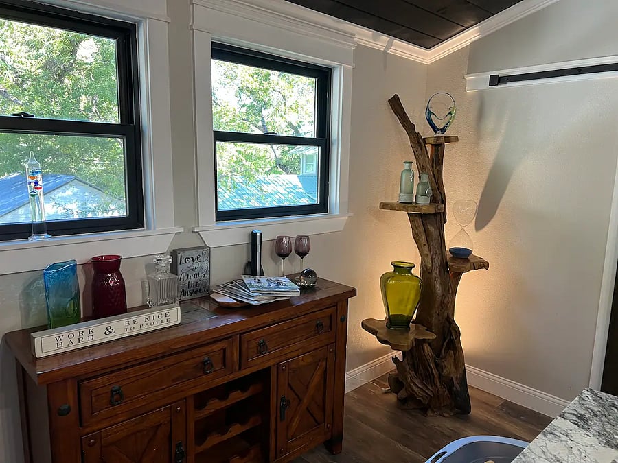 The apartment feels like an adult treehouse with views from the top of a 150 year pecan tree. But the most luxurious treehouse you will ever see!