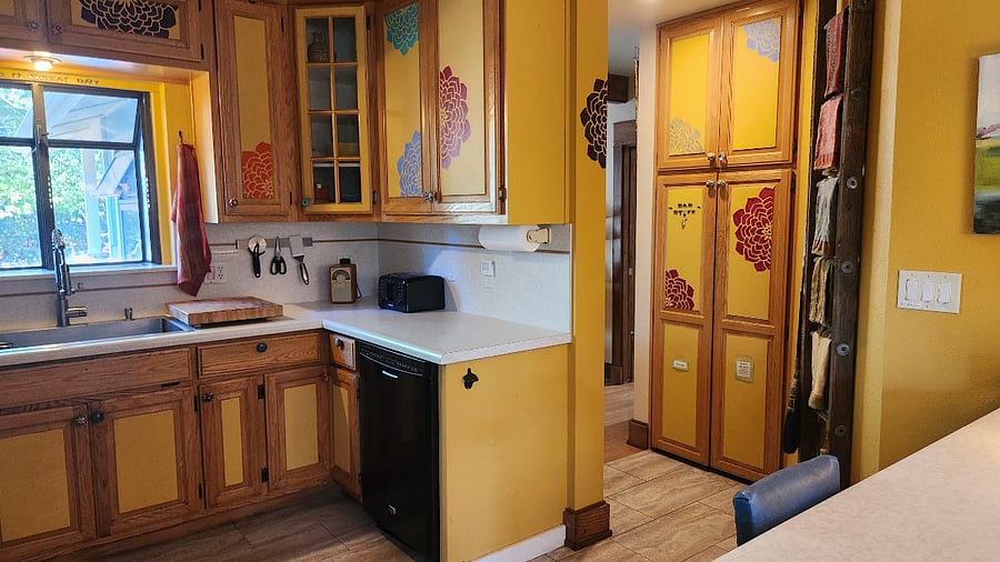 full kitchen with gas stove and dishwasher. 