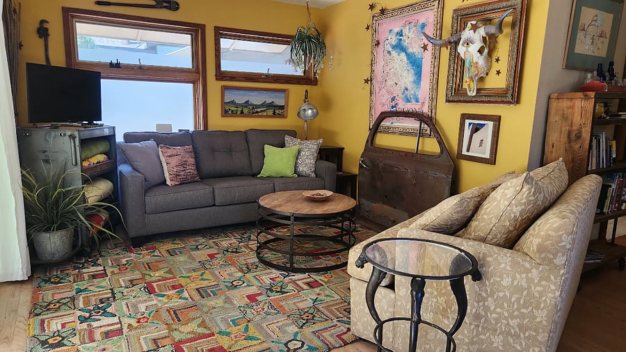AZ room opensHE up to the back porch with double sliding glass doors. 