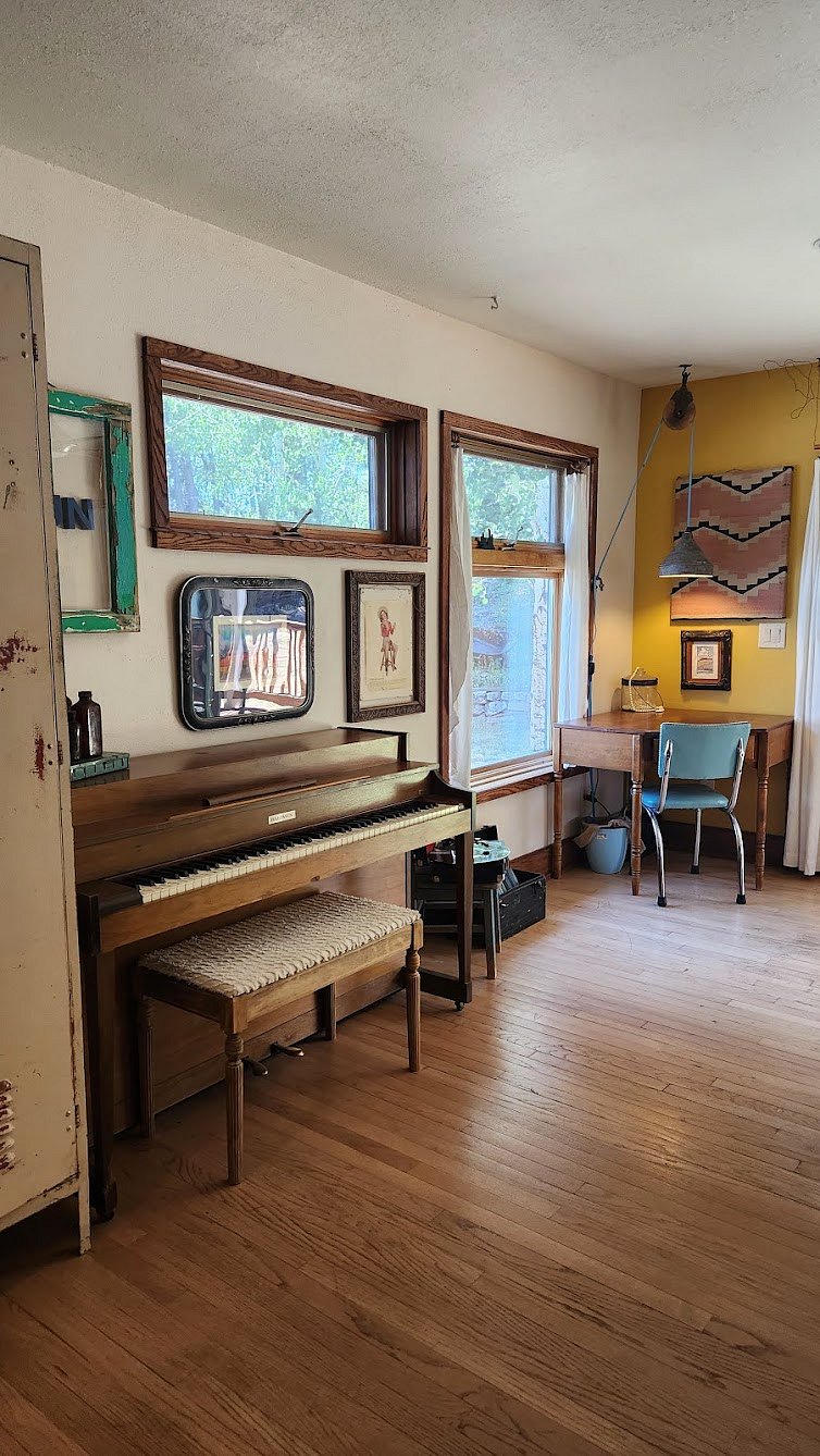 Play some tunes on the piano... or just pop a record on the record player. 