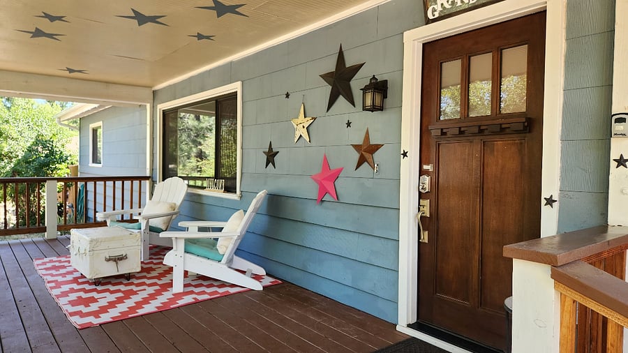 sunny front porch is perfect for morning coffee.