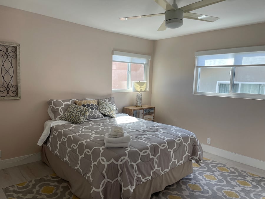 2nd bedroom - Queen bed, main level, dresser, full-sized closet, TV and ceiling fan