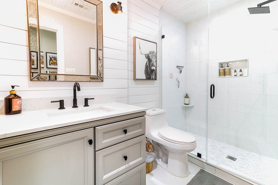 upstairs - guest's bathroom. Walk-in shower and vanity.