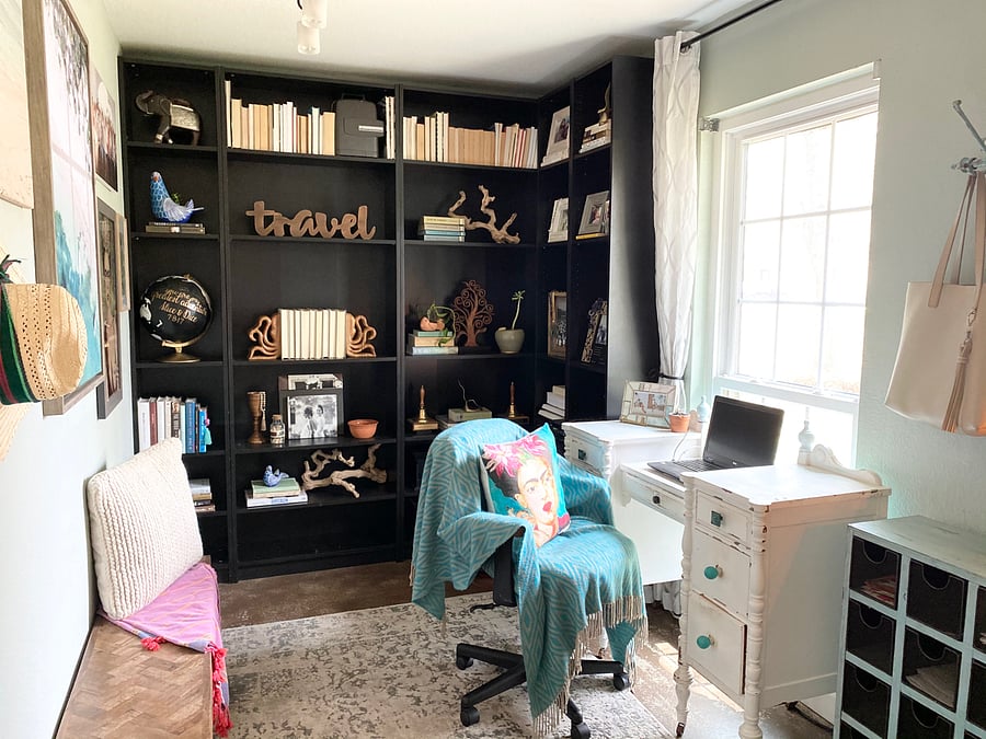 Dedicated office, desk, and books.