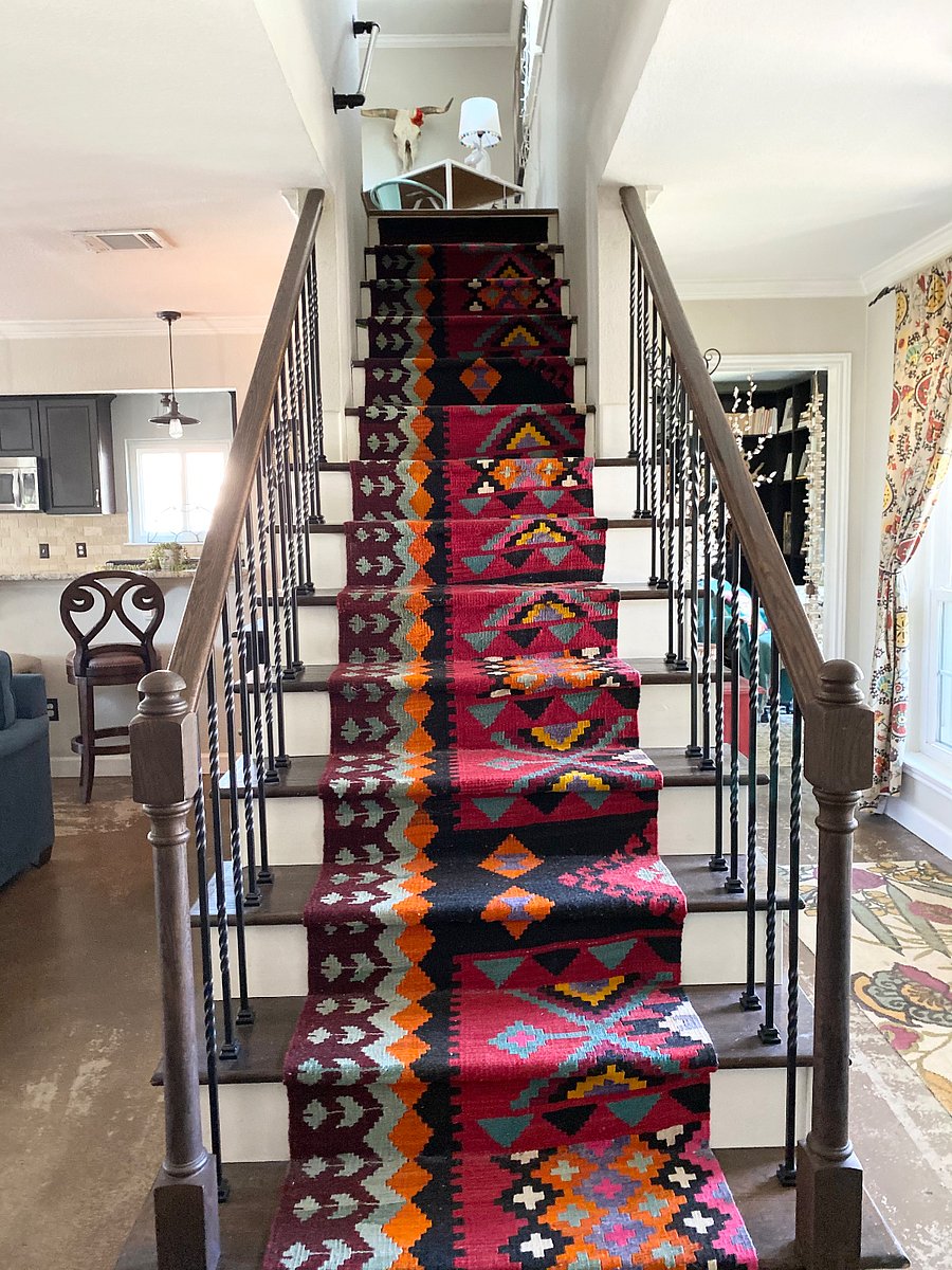Beautiful runner takes you upstairs to the second living room and all of the guest bedrooms and 2nd bathroom.