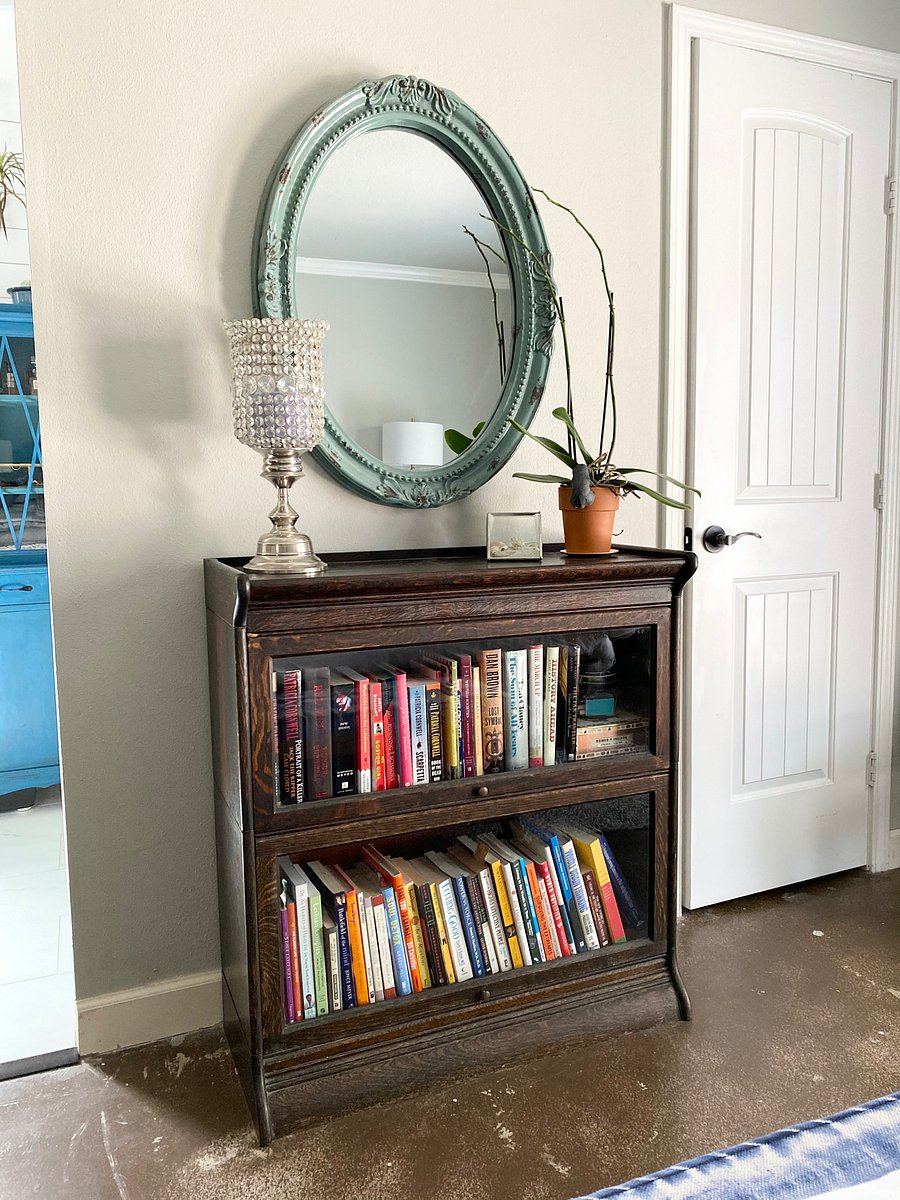 Primary room bookshelf with plenty of non-fiction and fiction books.