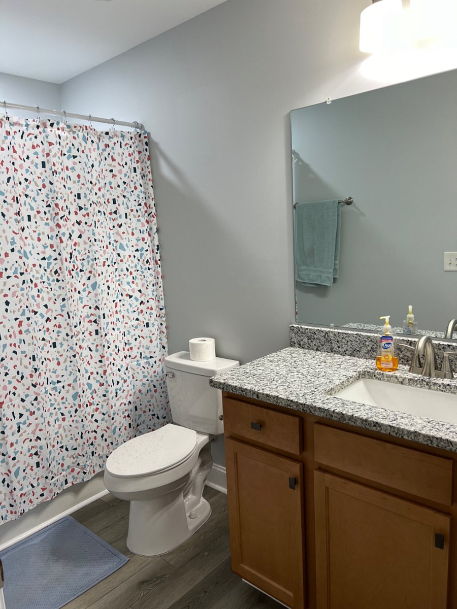 Private bath with tub/shower combo and granite countertop. Lots of storage room and all yours