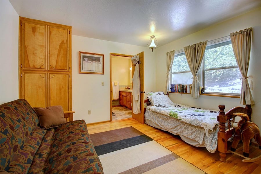 Bedroom furniture has changed. This room has a queen bed in it now.