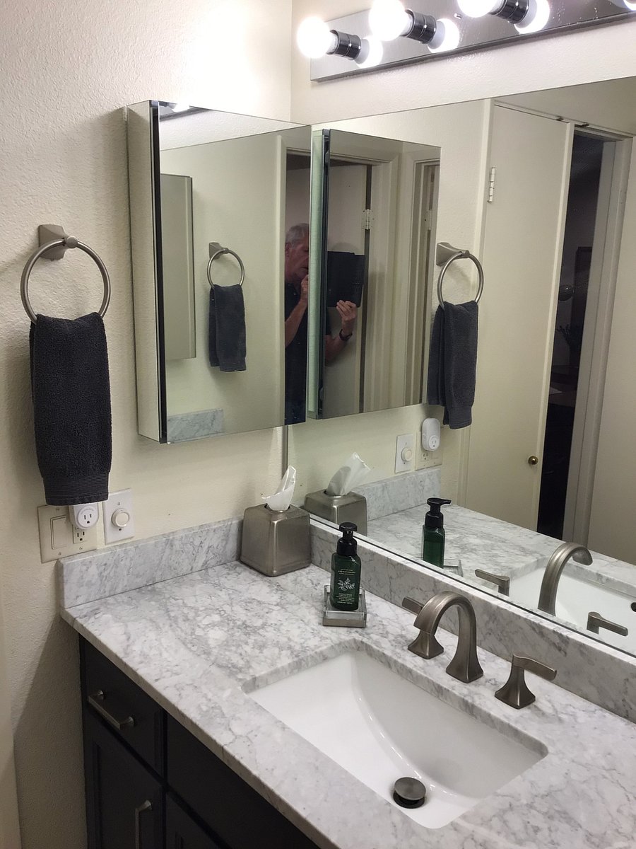 master bathroom sink with carera marble slab