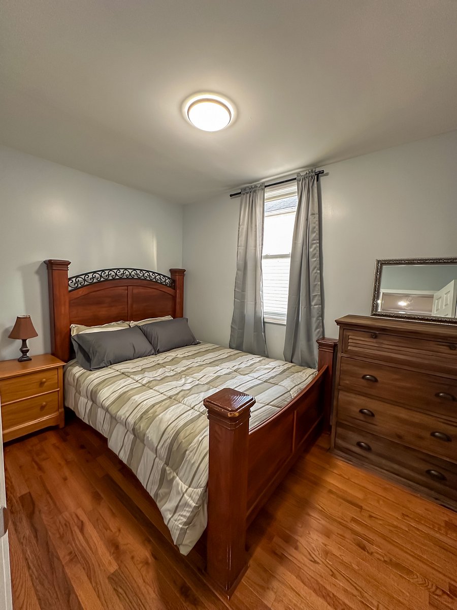 First floor bedroom with queen bed