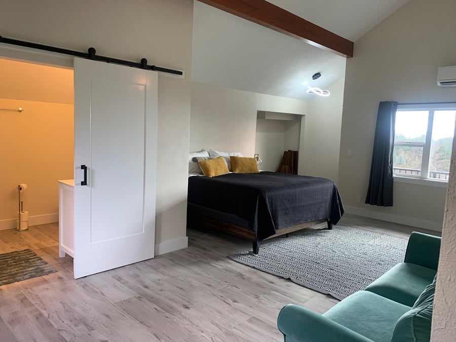 Master bedroom with a King Size bed and full bathroom