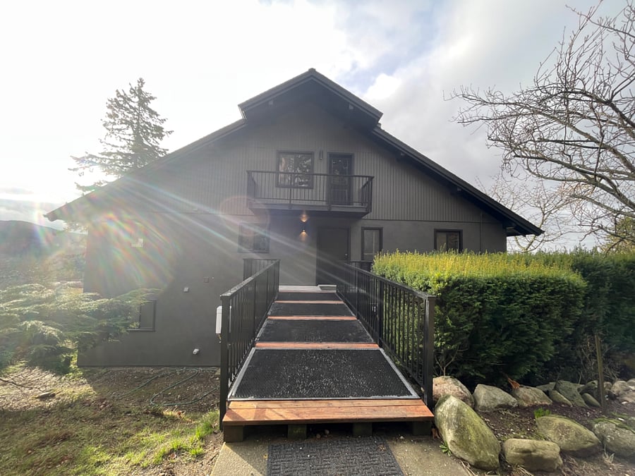 Main door to access the upper duplex. The upper duplex is the main and upper floor of the home.