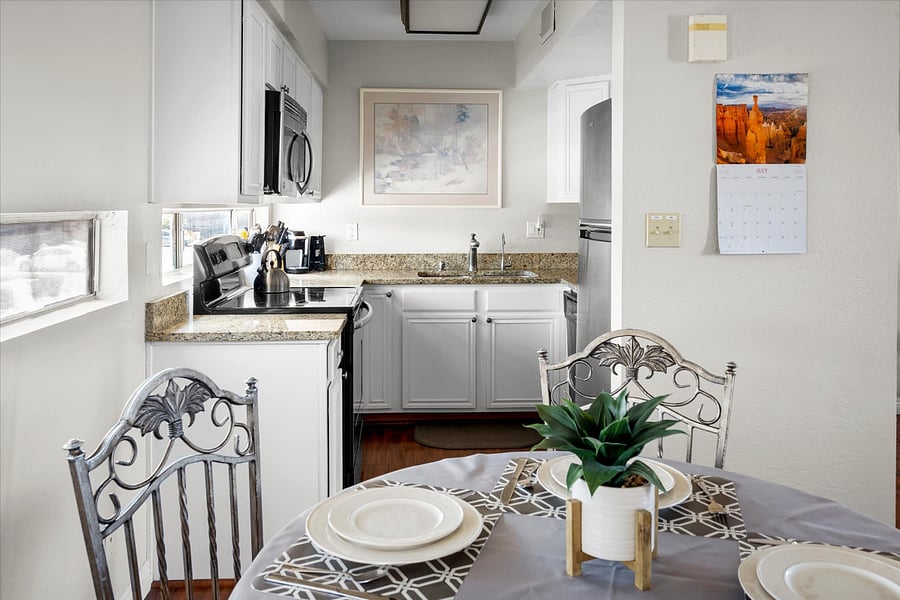 Step into a modern stainless steel kitchen, where elegance meets functionality.