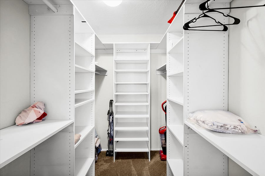 Bedroom 2: Experience the convenience of a walk-in closet, where keeping your belongings tidy and easily accessible becomes an everyday delight.
