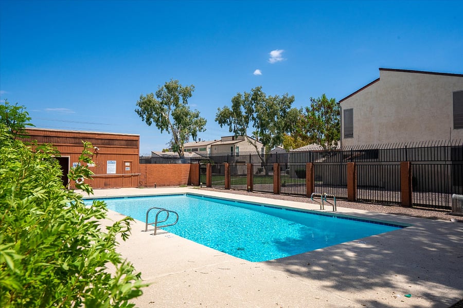 Experience the joy of effortless relaxation with direct access to the community pool, where a refreshing swim is just a few steps away, inviting you to unwind and recharge at your leisure.
