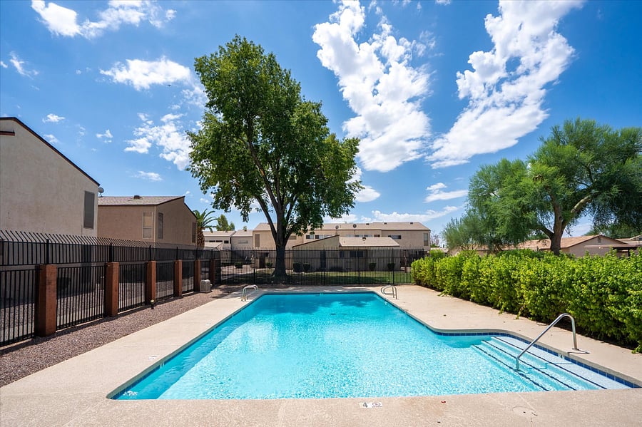 Enjoy the convenience of community pool access, inviting you to unwind and rejuvenate with a refreshing dip just steps away from the unit.