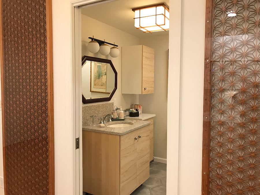 Spa like bathroom with antique Japanese screens at entrance