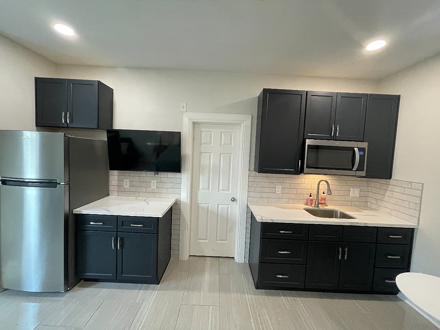 kitchenette with full refrigerator, microwave, sink, garbage disposal, air fryer also included