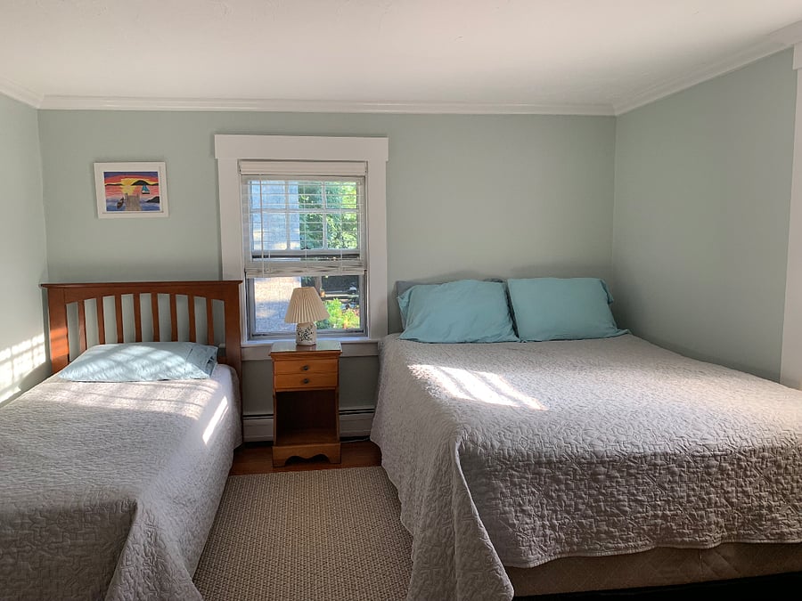 Queen bedroom with twin bed.