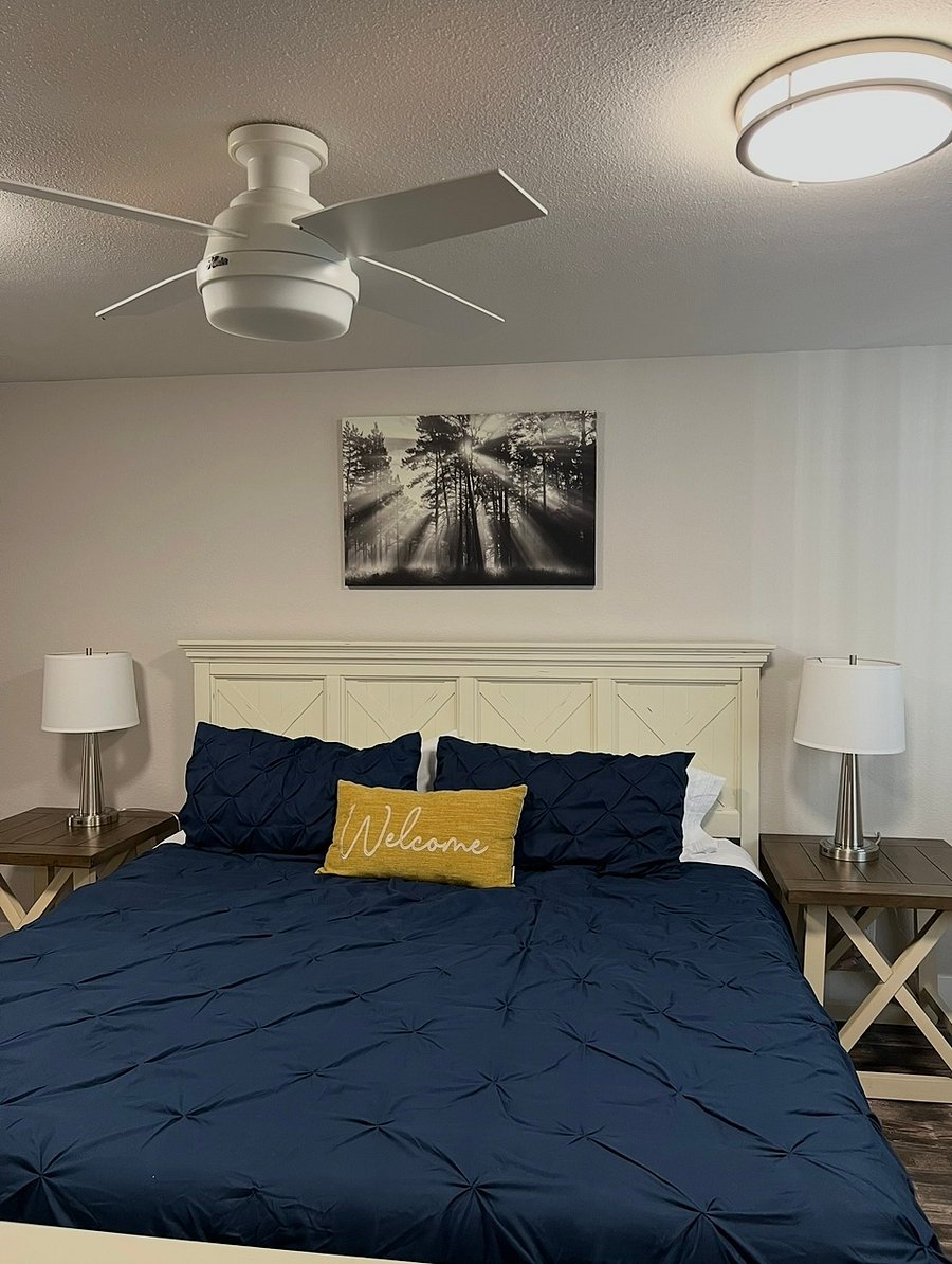 Primary Bedroom features- King bed, ensuite bathroom, enclosed shower/ toilet. Walkin closet, Laundry room with free washer/ dryer. Exit laundry room out to large covered deck.