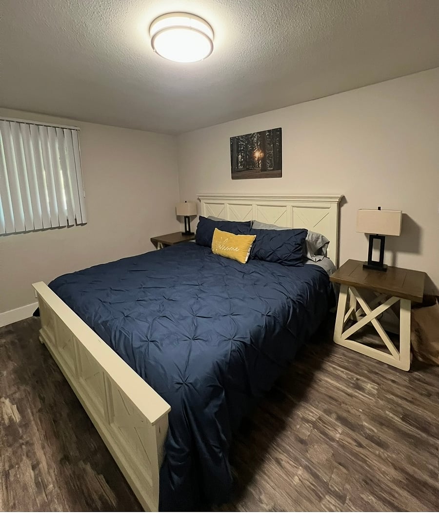 Second bedroom features a super comfortable King bed, large dresser, and a large closet, two windows.
Each Bedroom has its own heating/air conditioning unit with remote.
The hall bathroom has a double vanity, tub/shower, is shared with the bunk room