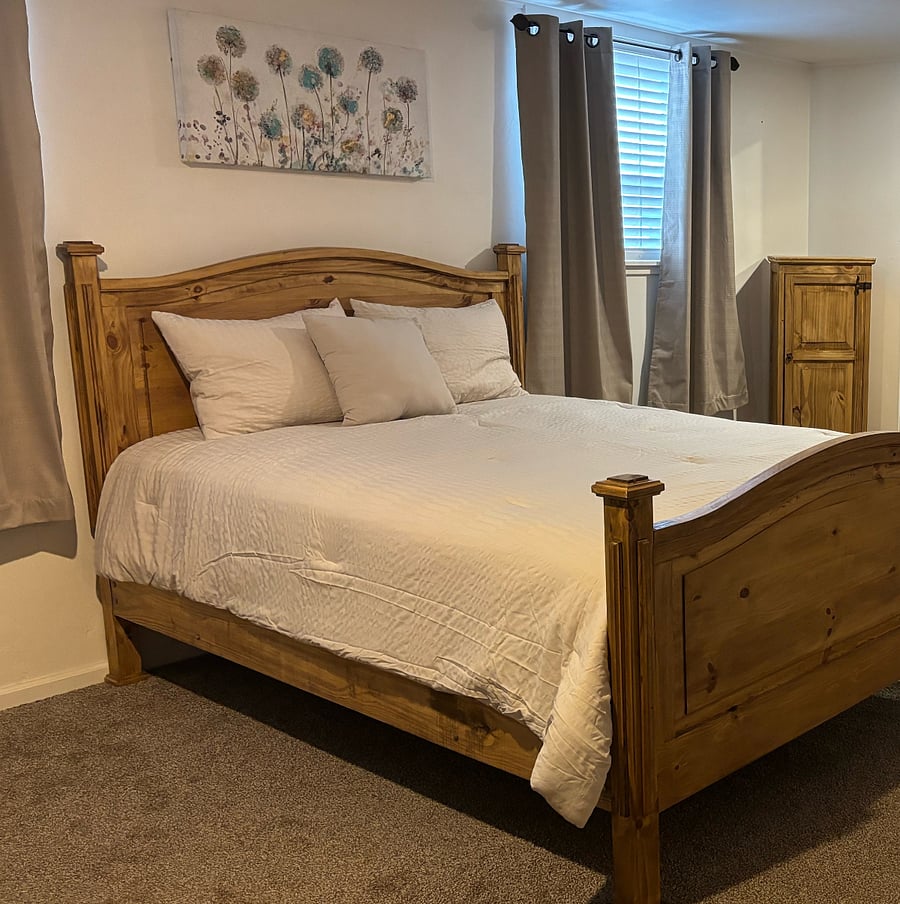 Bedroom 1. Queen size bed with complete bedding and a large closet.