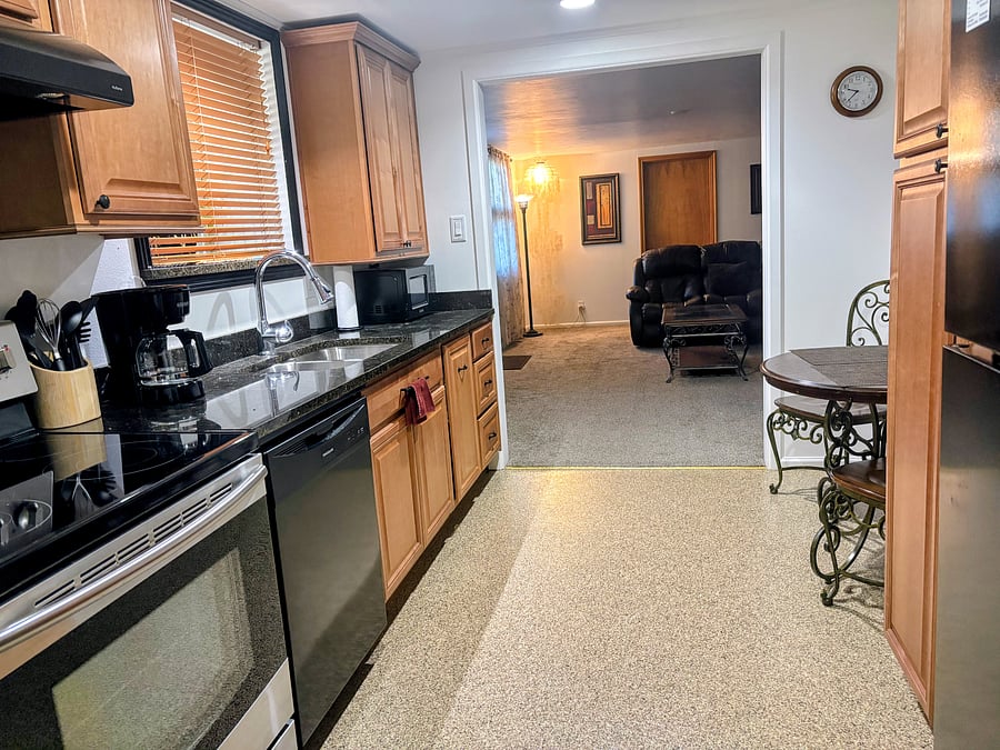 View of the kitchen into the living room.