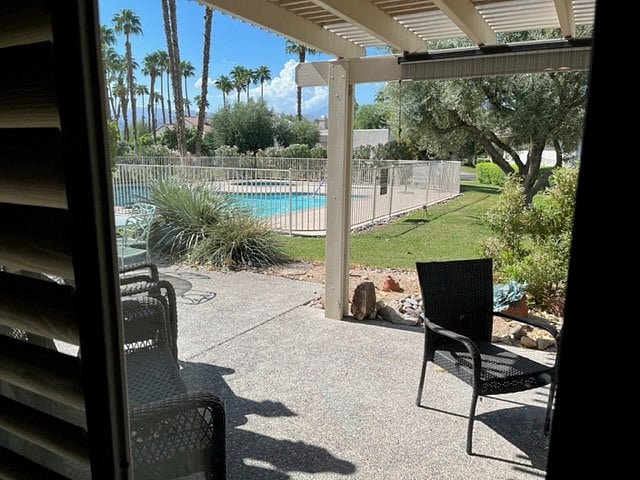 Patio area leading to pool