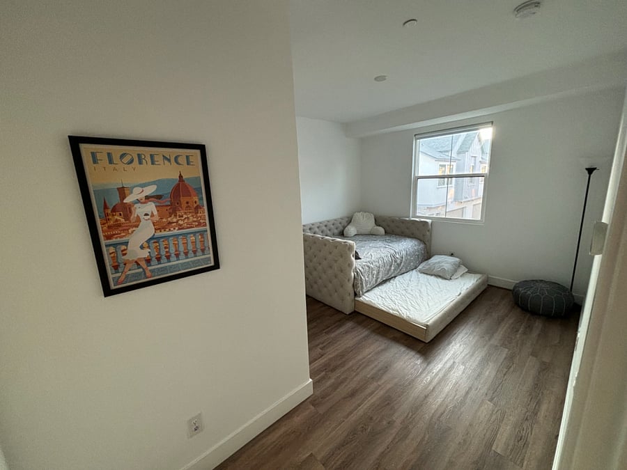 Florence bedroom is adjacent to second full bathroom upstairs. Is furnished w a full bed that has a trundle and has a walk in closet. 
