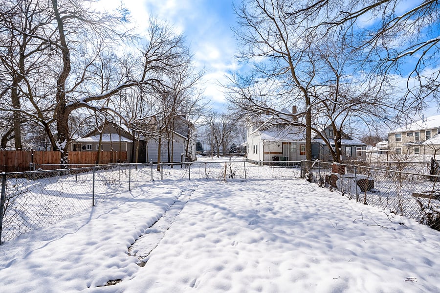 Fenced yard providing peace of mind for those traveling with kids and furry friends.