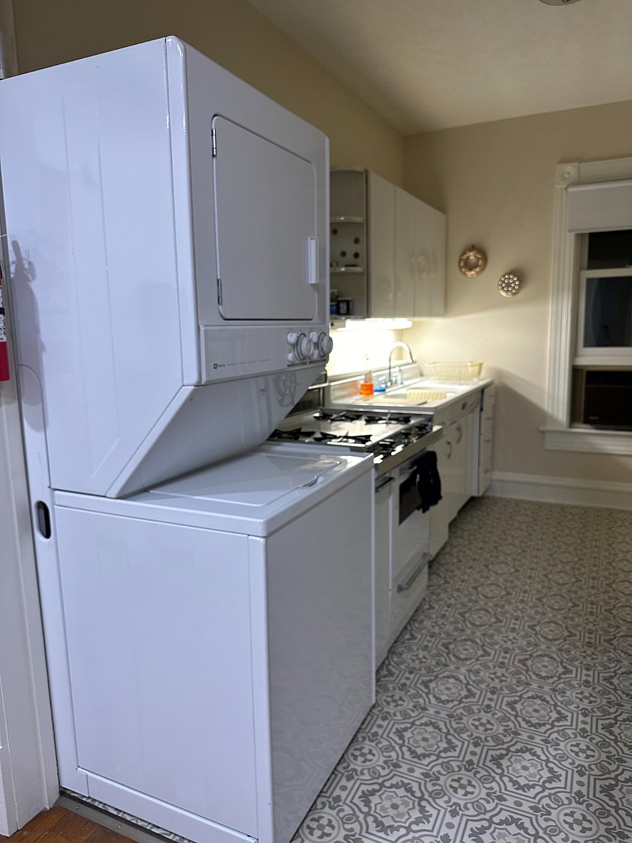Kitchen with washer and dryer. Laundry soap and dryer sheets are included. New refrigerator in 2023.