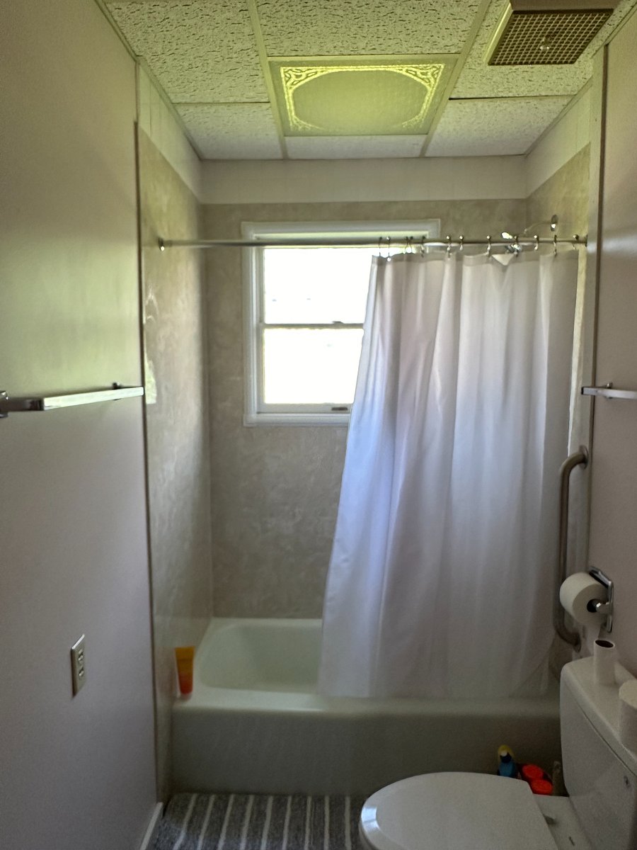 Bathroom with all new shower surround and plumbing.