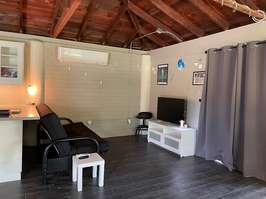 Living area with smart tv and futon
