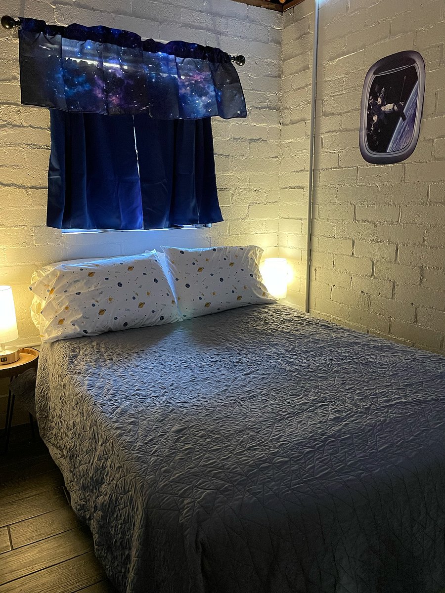 Bedroom with double bed that has storage underneath