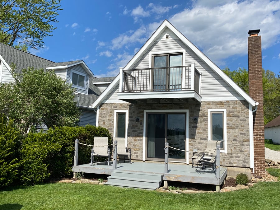 The porch overlooks the lake.