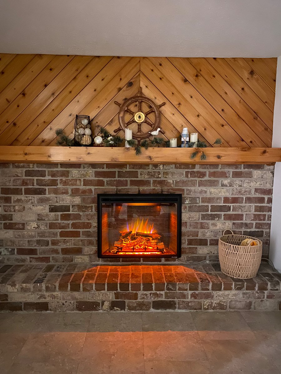 Electric fireplace warms a cozy evening on the lake!
