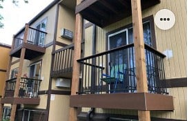 Deck, glass table, charcoal grill, overlooking the court yard
