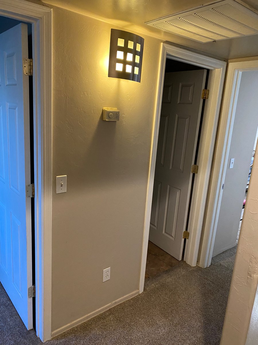 Hallway between bedroom and the bathroom