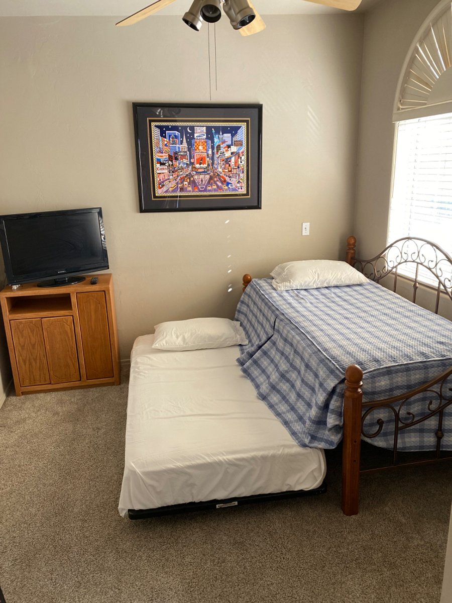 Guest bedroom (two twin set up, lower trundle does raise up to the same height as the other)