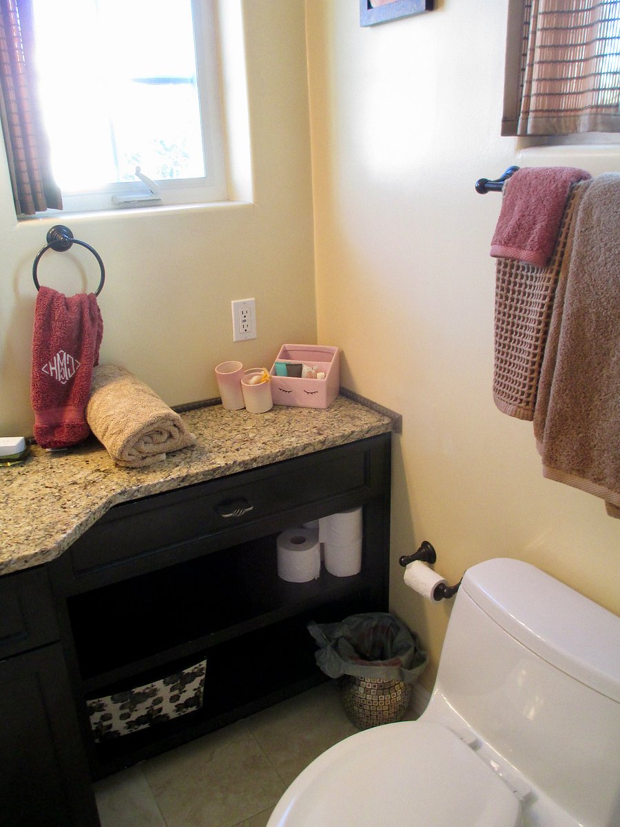 Plenty of storage in the bathroom. Custom cabinets.