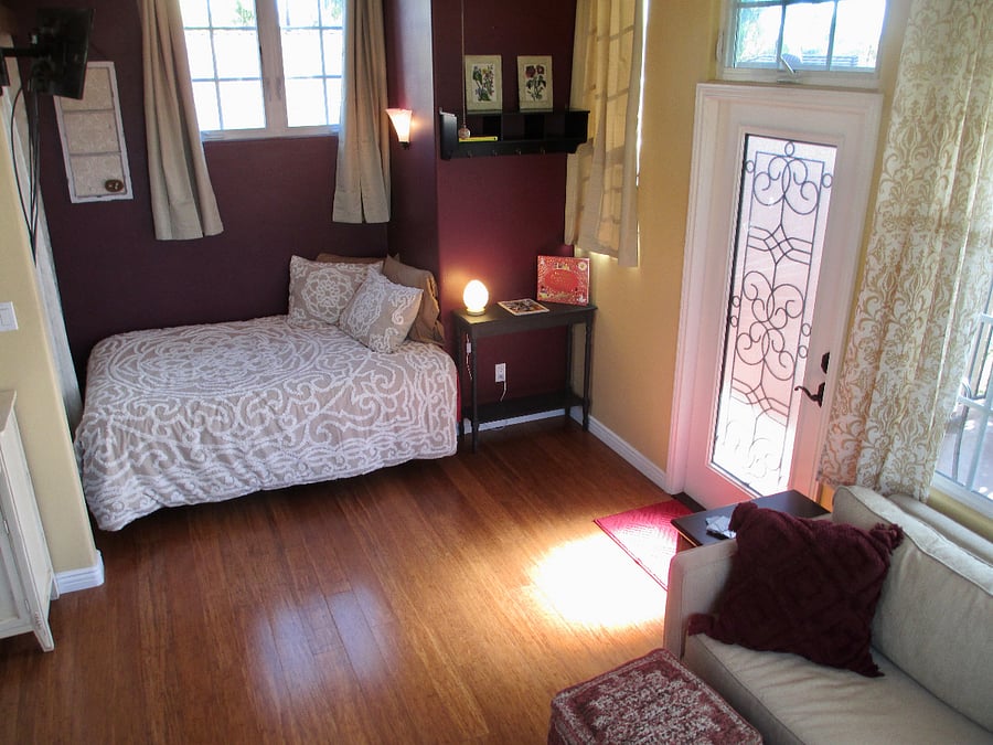 Bedroom cozy "alcove".  The full-size bed has been replaced by a Queen size bed that comes out from the wall-head  under window.  Making more room for two people.    