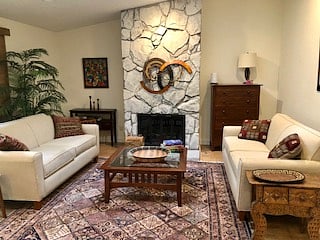 Or you can curl up by the fireplace on a comfy sofa in the shared family room.