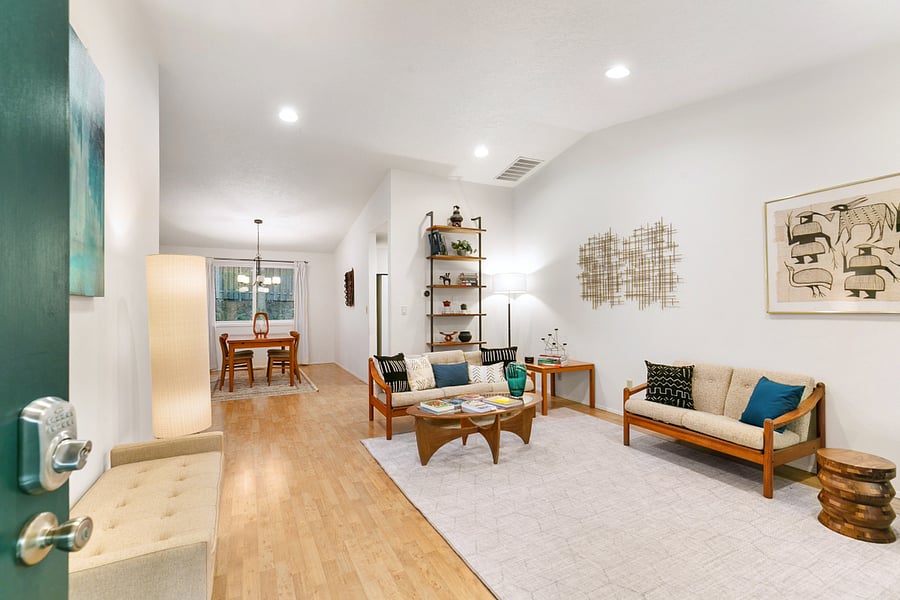 The front door opens on the spacious shared living room and dining room.