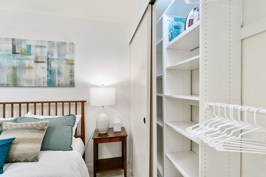 Store your belongings on the plentiful shelves and hangers in the two closets