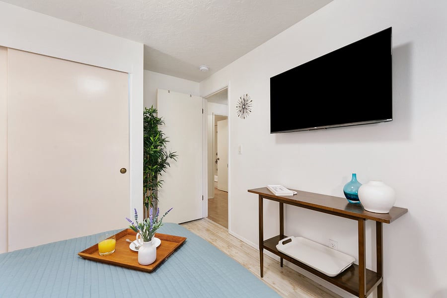 Your private bathroom is across the hall from the bedroom, only steps away.