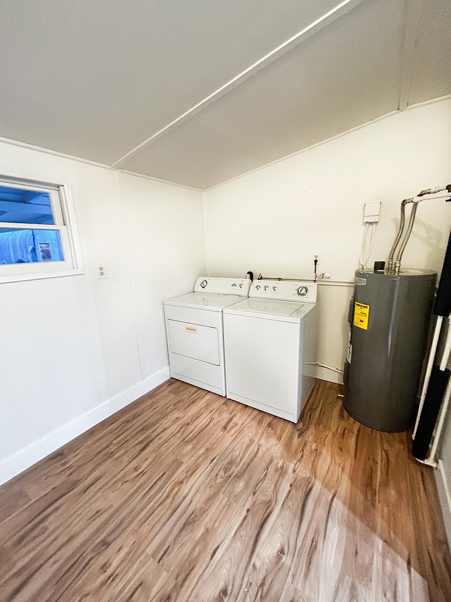 Washer and dryer in unit with new hot water heater.