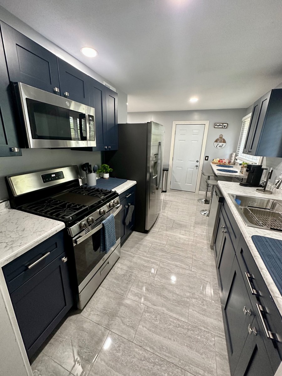 Kitchen Appliances: Stove, Microwave, Refrigerator, Dishwasher, Garbage disposal