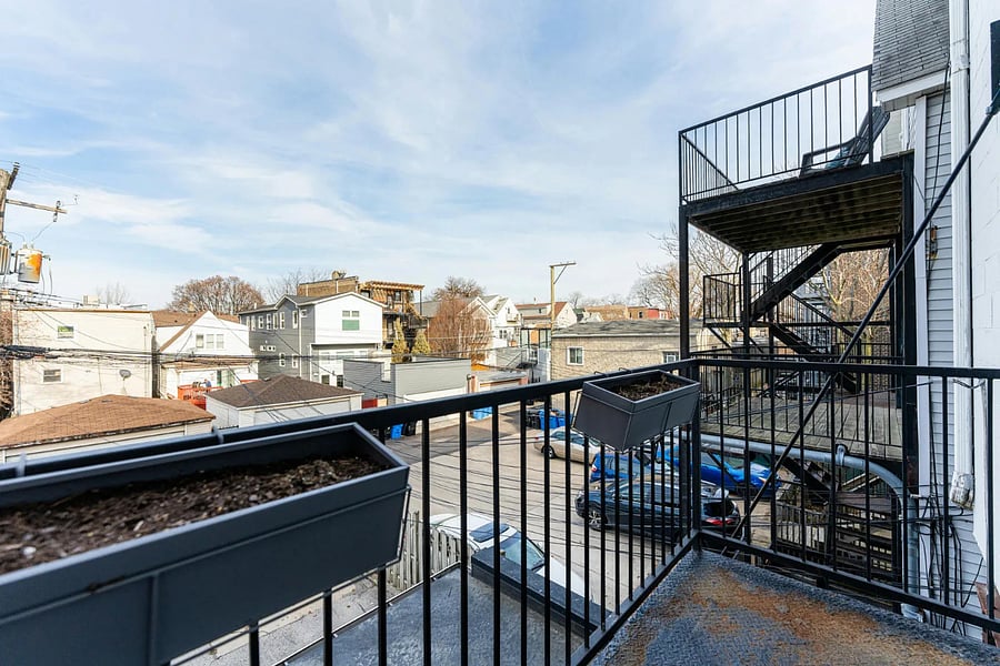 Balcony attached to primary bedroom (rear)
